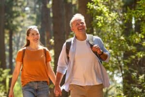Couple hiking on trail in Savage River State Forest