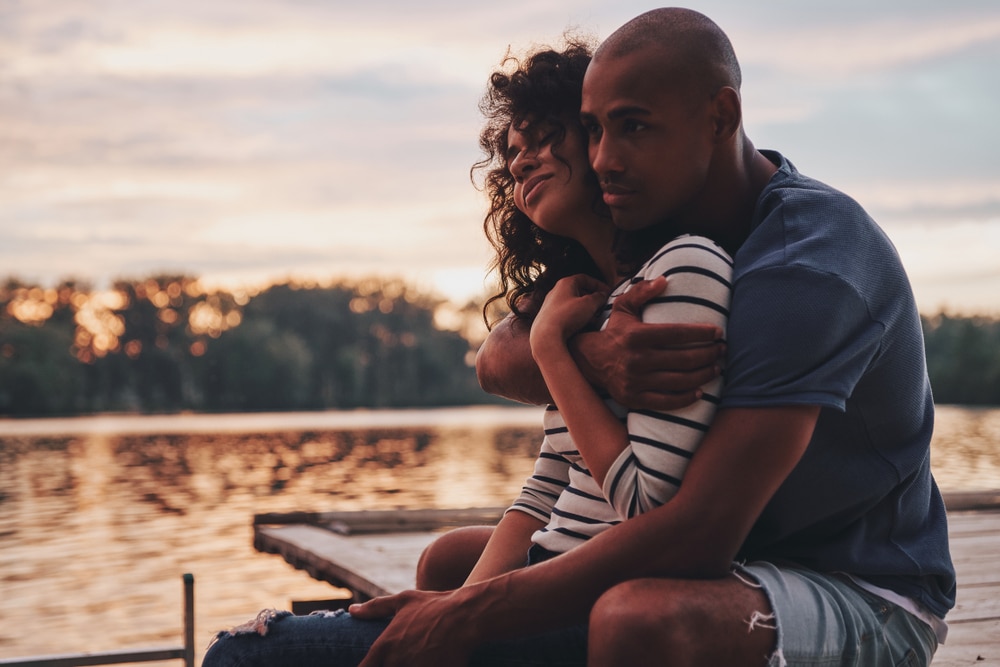 Romantic Getaways in Maryland, happy couple on the lake