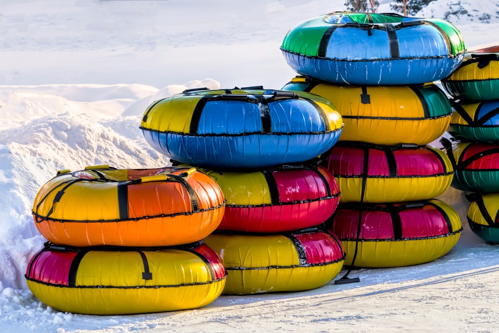 Snow tubing in Maryland is fun for everyone, especially at Wisp Resort across the street from our Deep Creek Lake Hotel